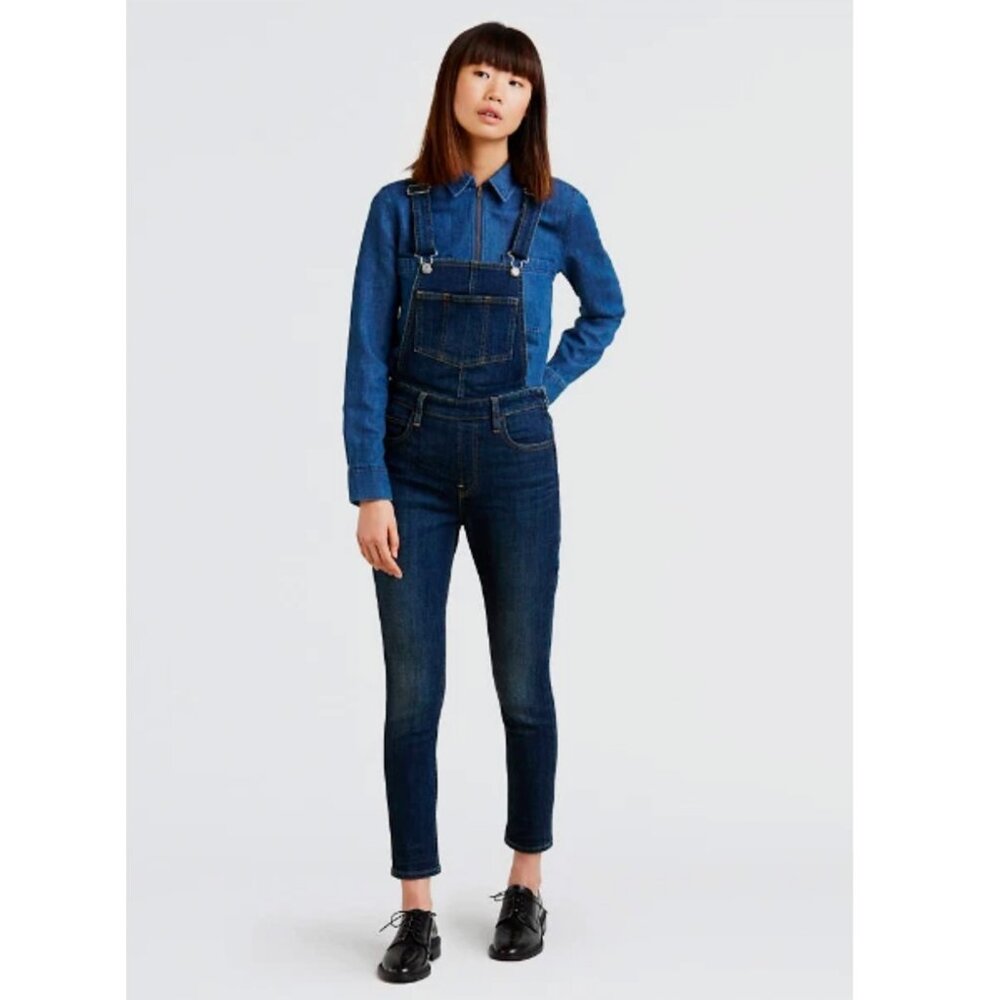 Free People Levi's Skinny Jean Overalls in Medium Blue Denim Wash in a Size 29